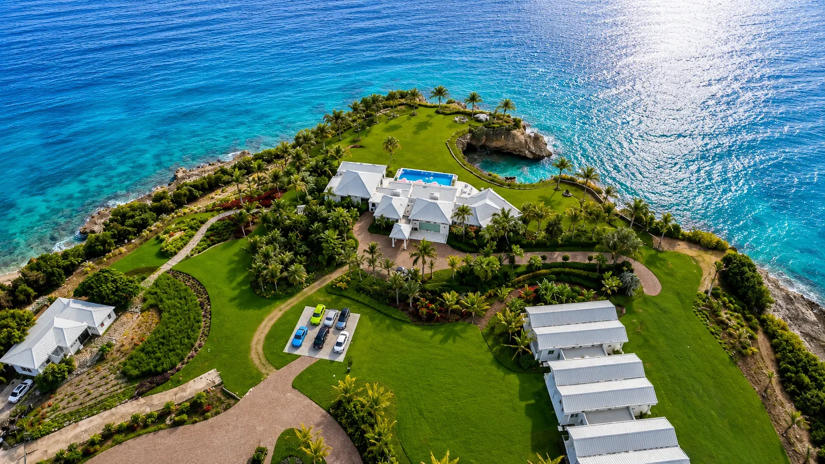 The estate grounds and fleet with the open Caribbean beyond