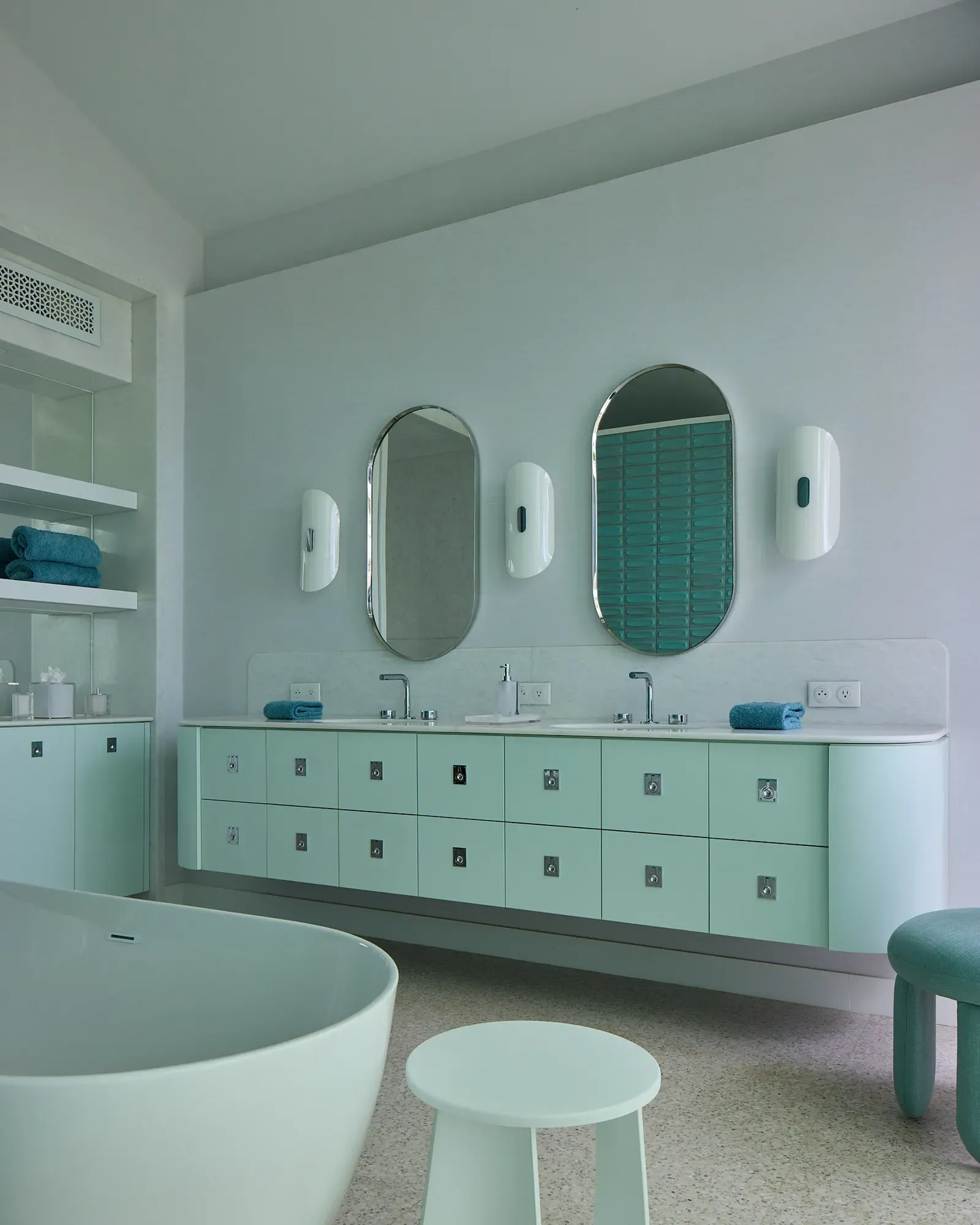 Mint bathroom with twin vanities
