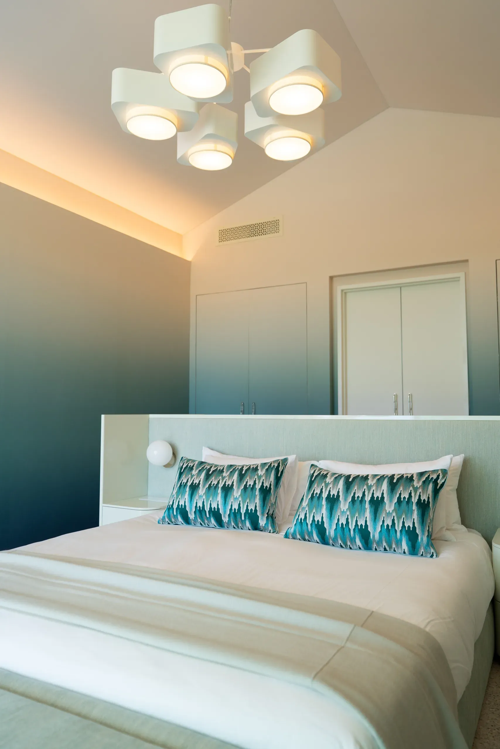 A teal suite in soft evening light