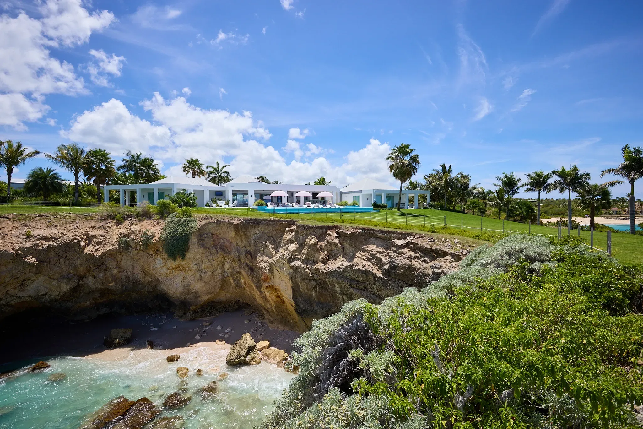The private cove and coastline below the estate