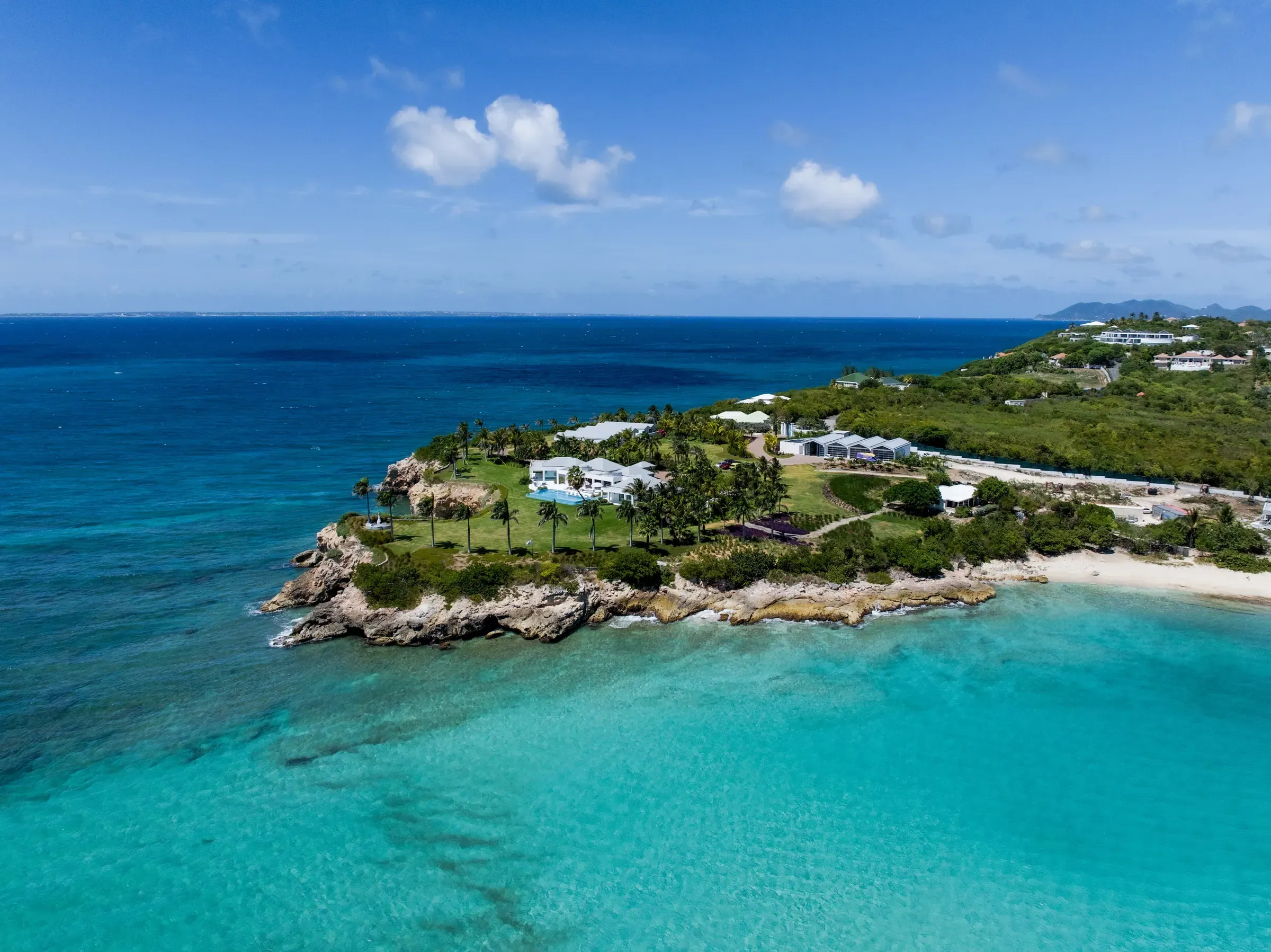 The peninsula estate surrounded by turquoise water