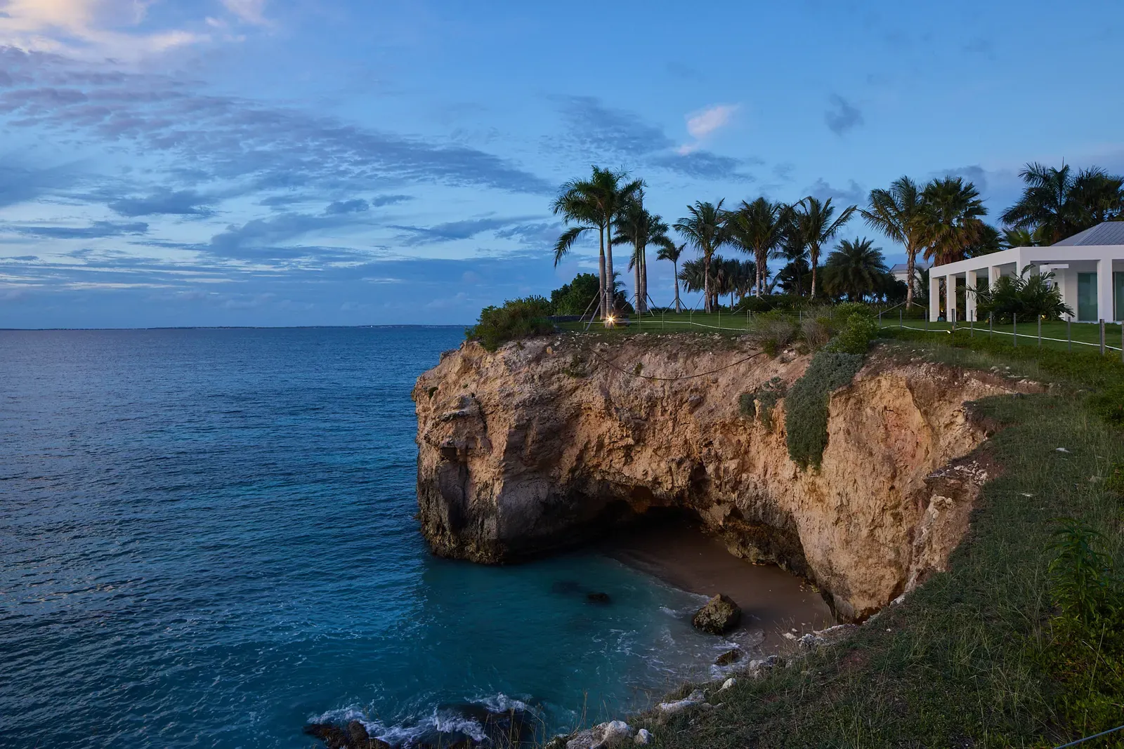 The Party House above the cove at dusk