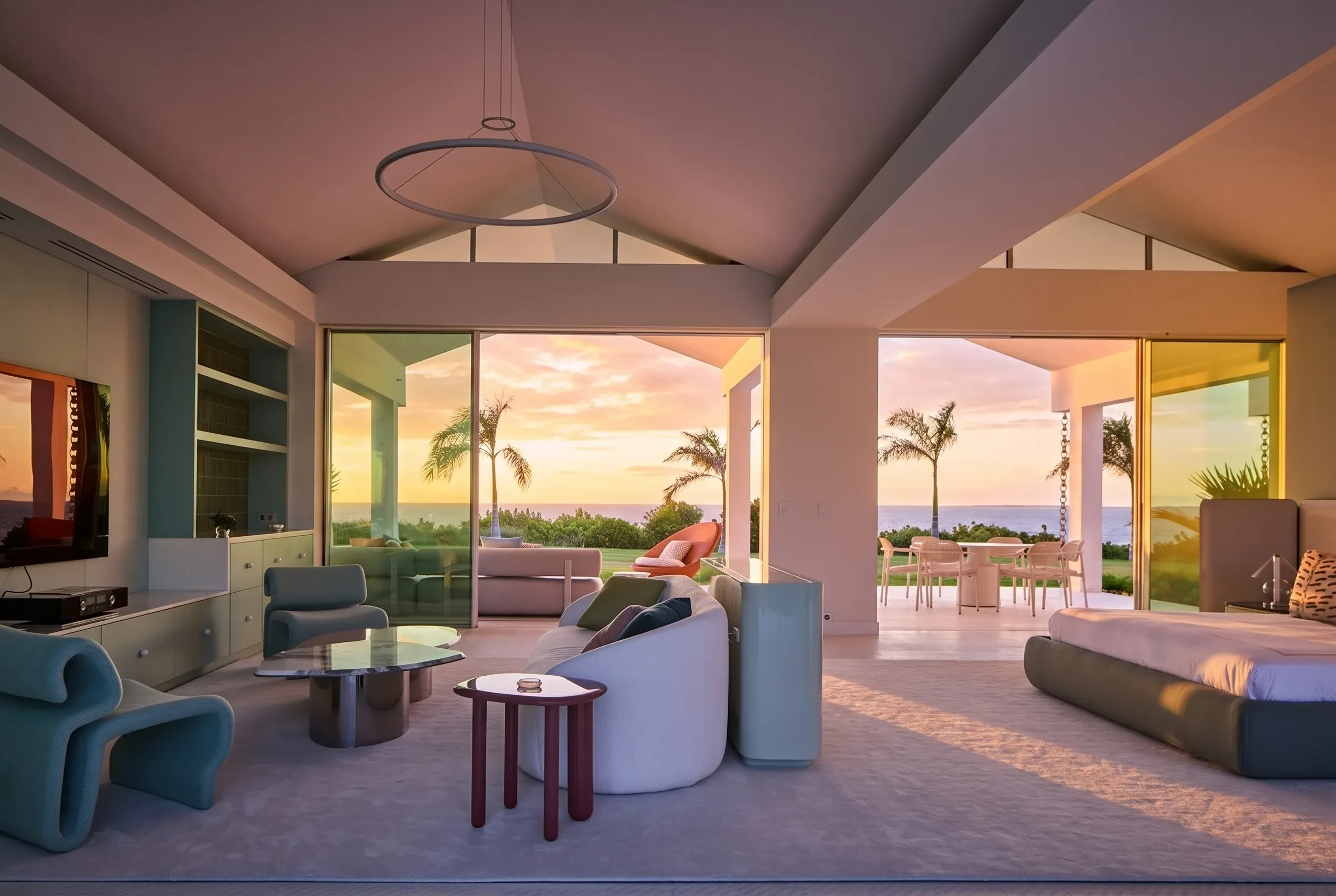 Lounge interior at sunset with ocean views