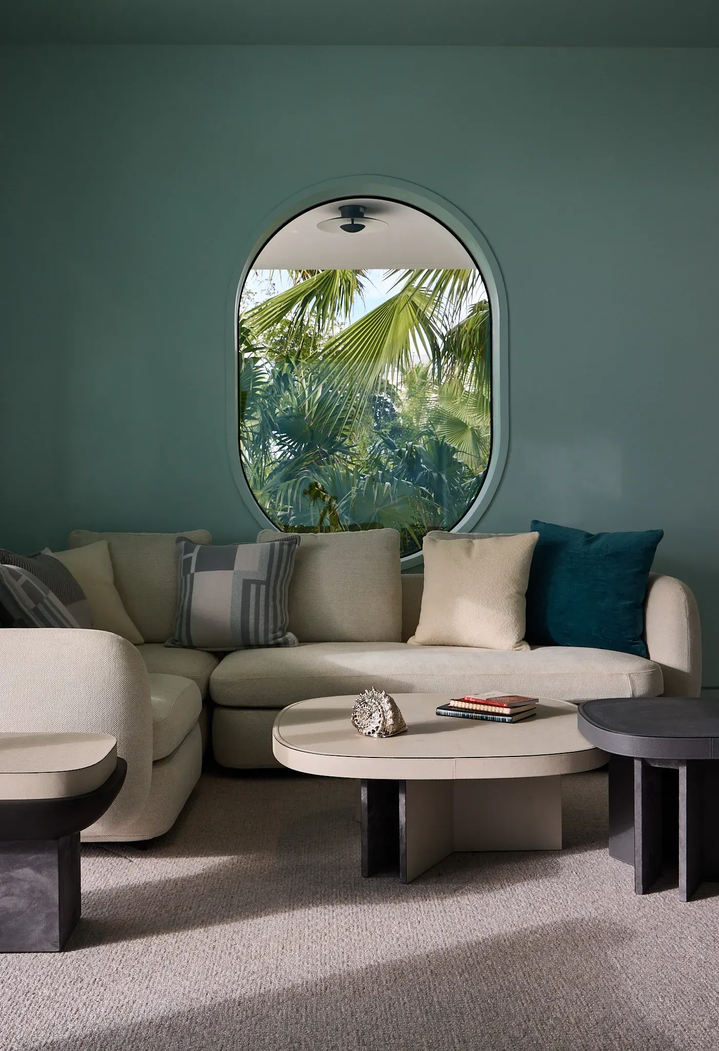Curved lounge seating with porthole mirror