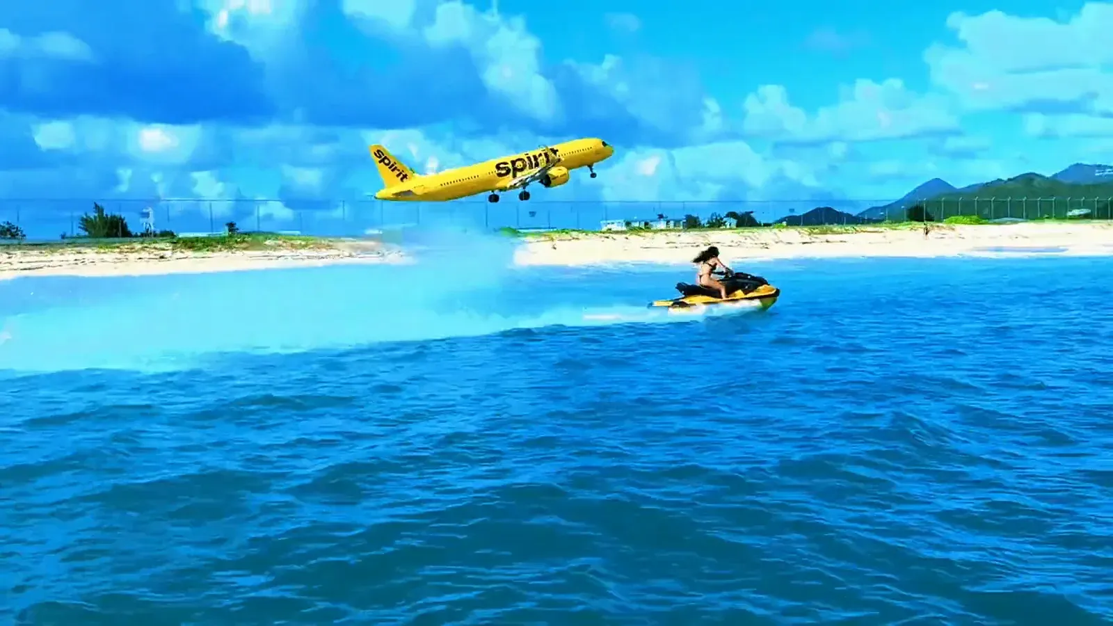 Water & Air — jet skis, the Bell 505 and Queen B Sport at full tilt